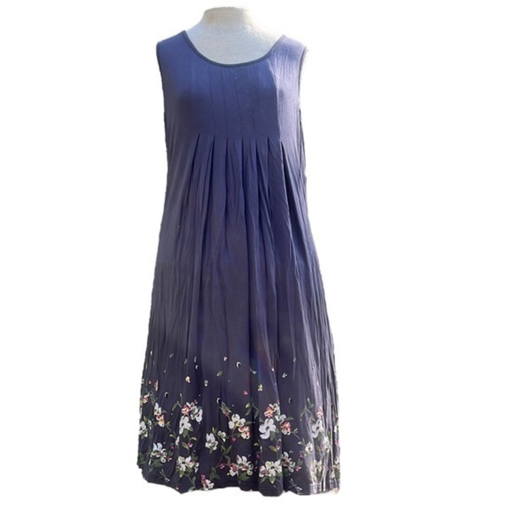Women’s mid length flowy dress, floral pattern on bottom, Stretchy, sleeveless